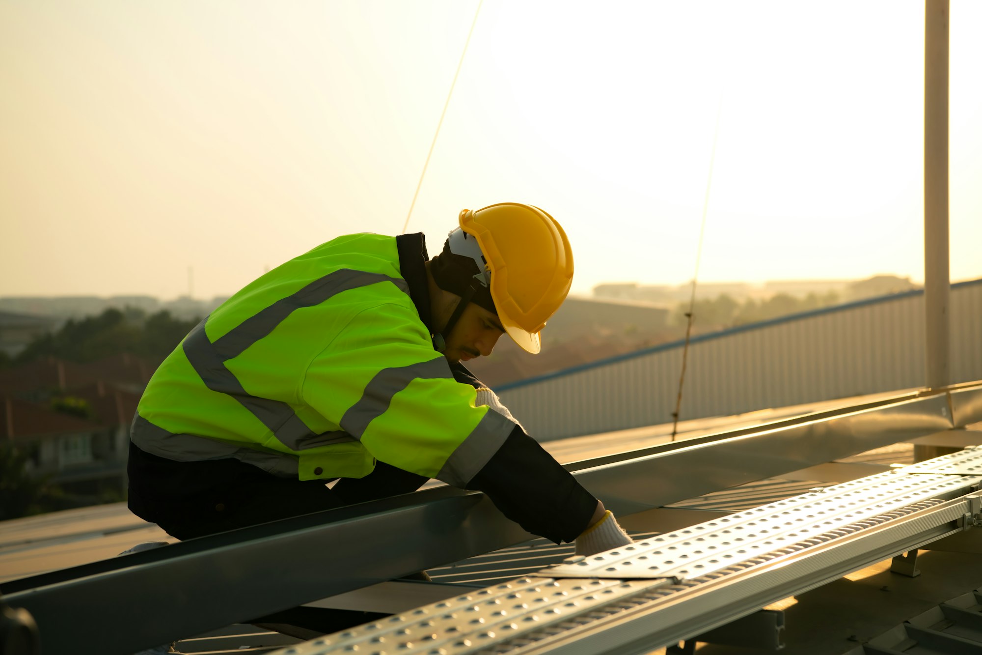 Technicians provide quarterly solar cell maintenance services on the factory roof